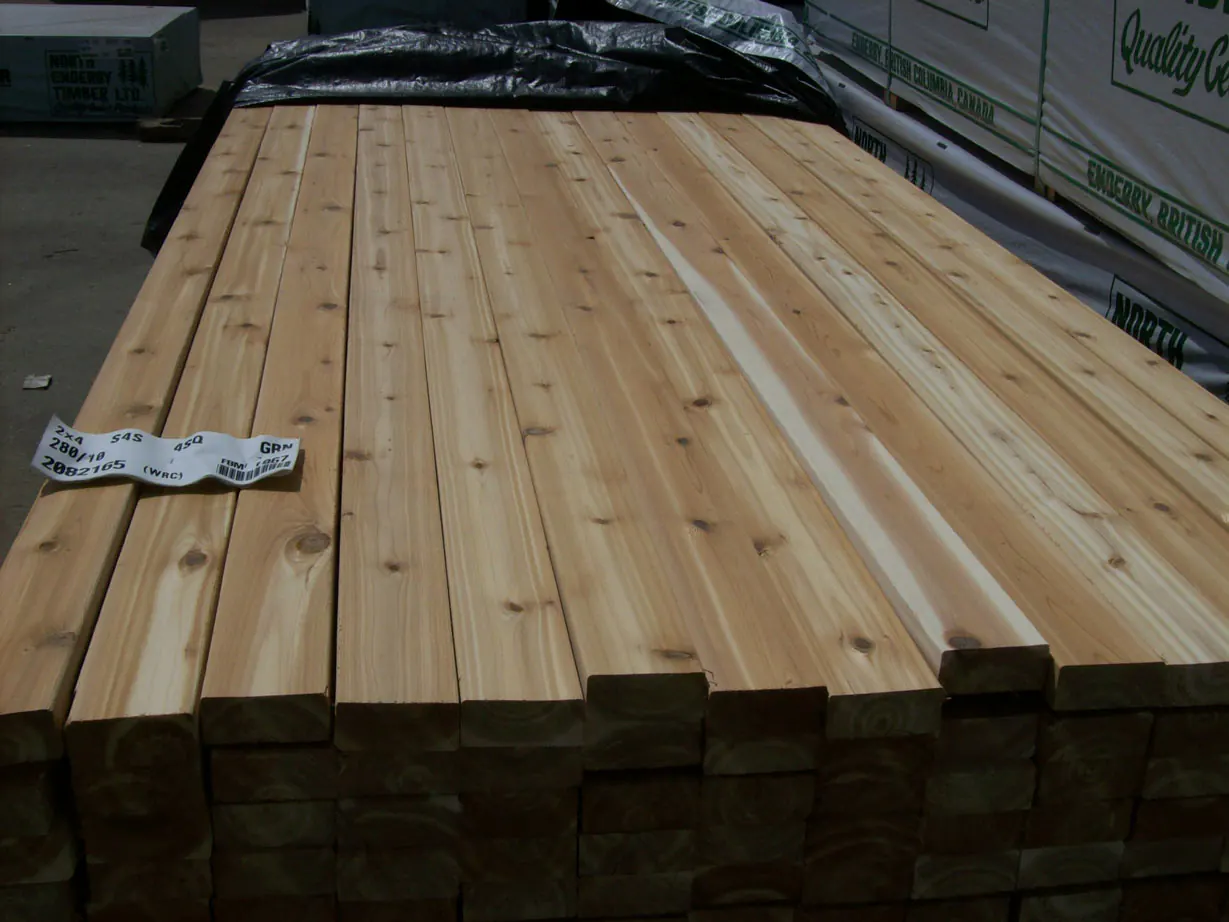 Bundled inland red cedar boards with a mill grade tag